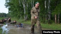 The Bogaty­rskaya Zastava (Heroes' Outpost) camp near the Siberian city of Omsk has operated for nearly two decades and says its goal is to "raise future warrior-defenders of the Motherland."