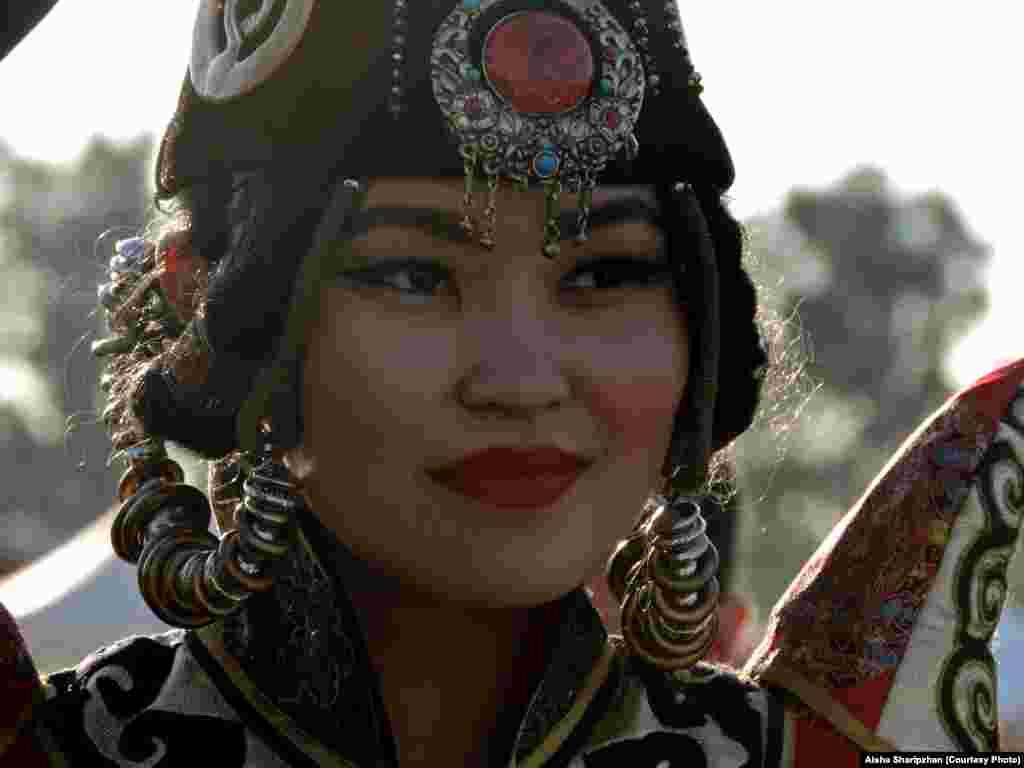 A young lady representing the Turkic speaking people of Tuva, in southern Siberia