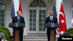 U.S. -- U.S. President Barack Obama (R) and Turkish Prime Minister Recep Tayyip Erdogan hold a joint news conference in the White House Rose Garden in Washington, 16May2013