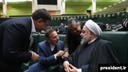Iranian President Hassan Rouhani speaking with MPs during the parliament session on delivering the new budget for the next financial year, on December 8, 2019.
