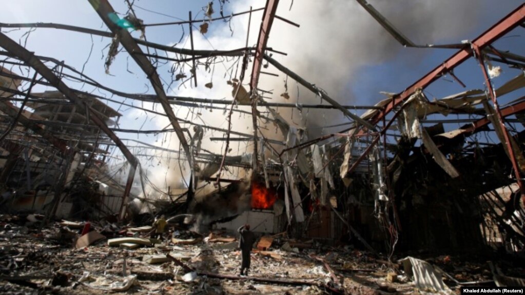 Smoke rises at a community hall where Saudi-led warplanes struck a funeral in Sanaa, the capital of Yemen, in October 2016.