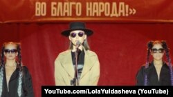 Lola Yo‘ldoshevaning “Sevgingni menga ayt 2” videoklipidan olingan kadr.