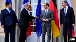 (Left to right) Ukrainian Foreign Miniser Pavlo Klimkin (left), French Foreign Minister Jean-Yves Le Drian, German Foreign Minister Heiko Maas, and Russian Foreign Minister Sergei Lavrov in Berlin on June 11