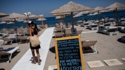 Upozorenje o fizičkoj distanci na plaži, ostrvo Kos, Grčka