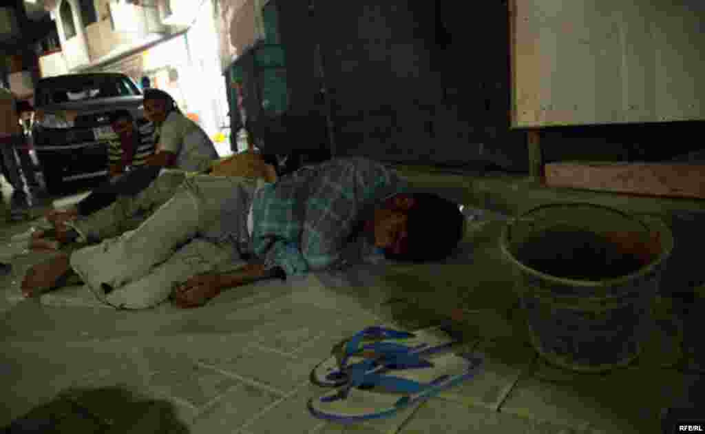 Rajao, an immigrant from Bangladesh, works on the construction of a new skyscraper. He has no permanent residence and sleeps at the building site.