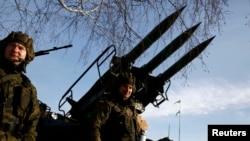 Polish soldiers attend the inauguration ceremony of bilateral military training between U.S. and Polish troops in Zagan, Poland, in January.