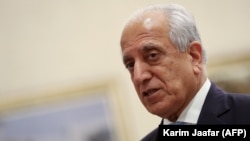 U.S. envoy Zalmay Khalilzad attends talks in the Qatari capital of Doha in July.
