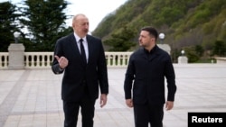 Ukrainians President Zelenskyy (right) visits Azerbaijan for talks with Azerbaijani leader Ilham Aliyev.