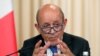 French Foreign Minister Jean-Yves Le Drian gestures as he speaks after a meeting of the Russian-French Security Cooperation Council in Moscow, September 9, 2019