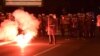 Antigovernment protesters clash with police in Podgorica on October 18. The government accuses Russia and Serbia of stirring up trouble.