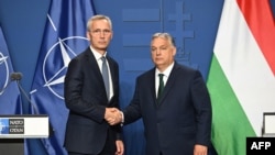 Генеральный секретарь НАТО Йенс Столтенберг и премьер-министр Венгрии Виктор Орбан
