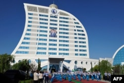 Dancers perform during the opening of a new hotel in Avaza. (file photo)