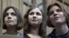 Обвиняемые участницы Pussy Riot: Надежда Толоконникова, Мария Алёхина и Екатерина Самуцевич