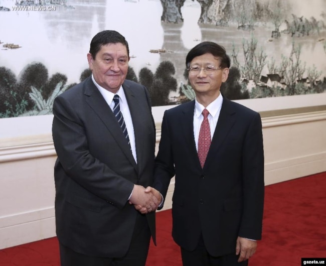 Rustam Inoyatov (left), the former head of Uzbekistan's National Security Service, during a visit to China in October 2014