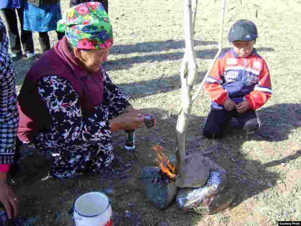 The wedding celebration begins with lighting a fire with oil and cotton.