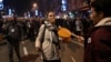 Serbian opposition protesters rally on the streets of Belgrade on December 25. 