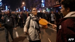 Serbian opposition protesters rally on the streets of Belgrade on December 25. 