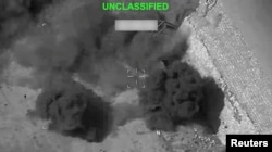 An image released by the American military in July 20 show explosions at an unknown location during what US Central Command says was another round of strikes on Iran.