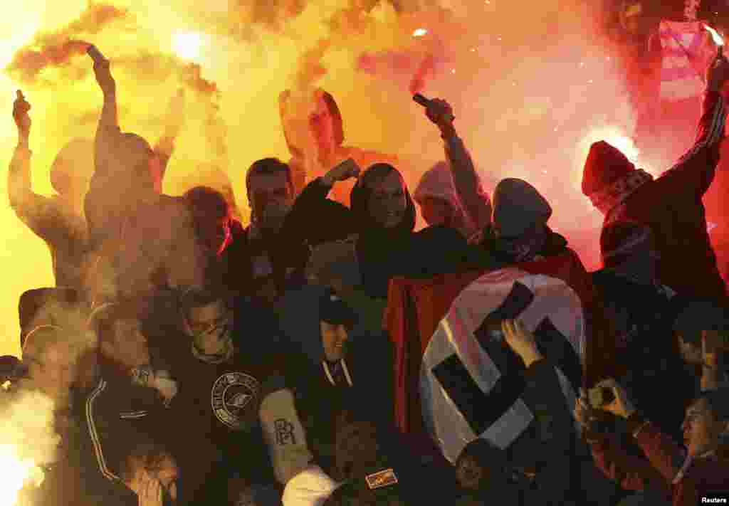 Fans in the Spartak Moscow stands hold a Nazi flag during the Russian Cup playoff match in Yaroslavl on October 30 between Spartak and Shinnik Yaroslavl. (Reuters/Vladimir Kutin)