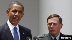 U.S. President Barack Obama with General David Petraeus , the top U.S. commander in Afghanistan