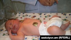 Armenia -- World's 7 billionth baby Vahram Voskanian born in Artik, Armenia, 31Oct2011