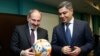 Armenia - Prime Minister Nikol Pashinian (L) and National Security Service Director Artur Vanetsian visit the Football Academy in Yerevan, March 25, 2019.
