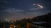 FILE PHOTO:A picture taken early on January 21, 2019 shows Syrian air defence batteries responding to what the Syrian state media said were Israeli missiles targeting Damascus.