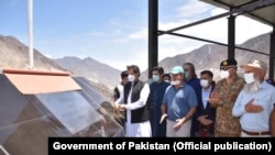 Pakistani Prime Minister Imran Khan kicks of the construction of Diamer Bhasha Dam in Gilgit-Baltistan, a contested part of Kashmir claimed by both Pakistan and India, in July.