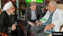Фидель Кастро (справа) во время встречи в Гаване с президентом Ирана Хассаном Рухани (слева), 19 сентября 2016 г. 