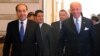 Despite a recent visit from U.S. Vice President Joe Biden (right), Iraqi Prime Minister Nuri al-Maliki has shown no inclination to interfere in the vetting commission's banning of candidates.