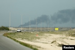 Smoke billows from Saudi Aramco's Ras Tanura oil refinery after a reported Iranian drone strike on March 2.