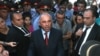 Armenia - Police chief Alik Sargsian talks to protesters outside the government building in Yerevan, 1Sept2011.