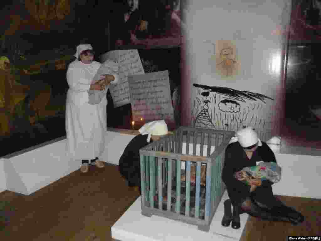 A scene showing how female prisoners fed their children. Mothers saw their children only at feeding time. The mothers worked the rest of the time.