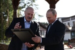 Президент Білорусі Олександр Лукашенко та президент Росії Володимир Путін, Мінськ, Білорусь, 2019 рік