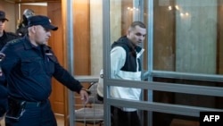 U.S. Army Sergeant Gordon Black, who was detained on suspicion of theft, appears in court in the Far East city of Vladivostok on June 6.