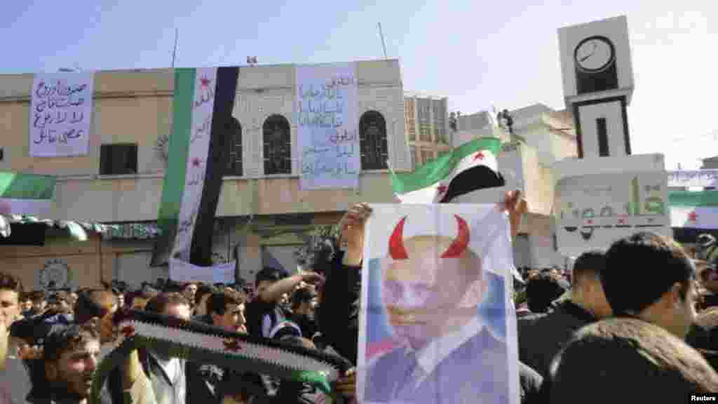Антипутинския демонстрация во время жума-намаза вблизи Хомса, 3 февраля.