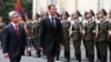 Armenia -- The presidents of Armenia and Syria inspect a guard of honor outside the presidential palace in Yerevan on June 17, 2009.