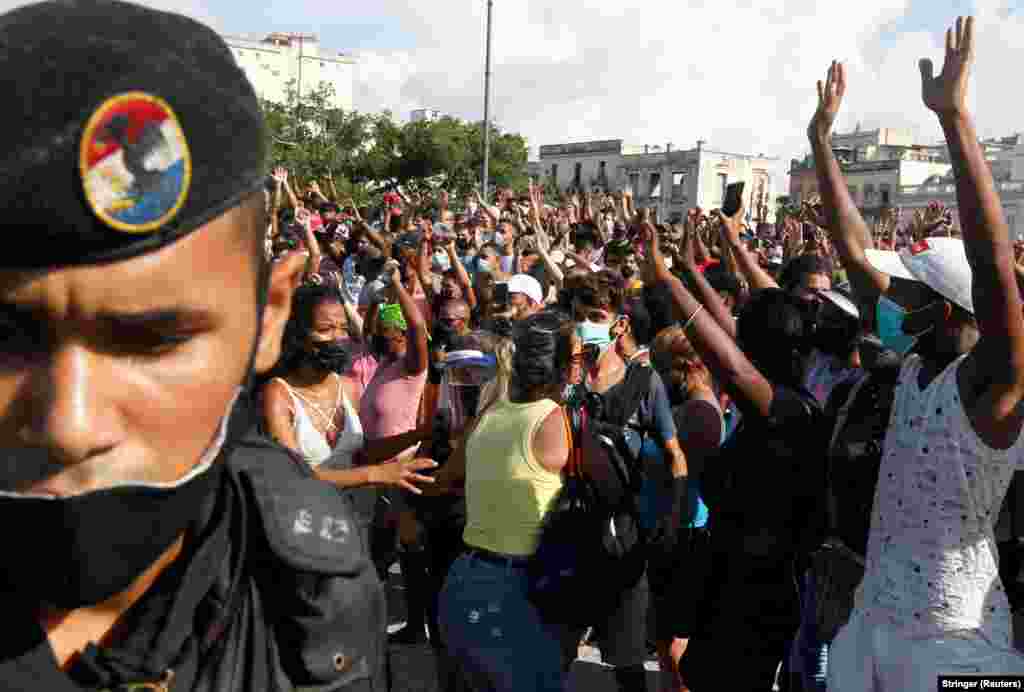 People react during protests against the government in Havana on July 11, 2021.