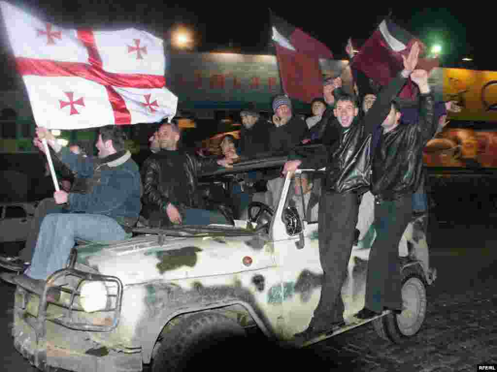 Young men celebrate the Rose Revolution in Georgia in 2003. RFE/RL’s Georgian Service was there to cover it.