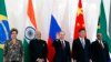 Turkey -- Brazil's President Dilma Rousseff (L), Indian Prime Minister Narendra Modi (2-L), Russian President Vladimir Putin (C), Chinese President Xi Jinping (2-R) and South African President Jacob Zuma (R) pose during a family photo during the BRICS le