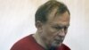 Istoričar Oleg Sokolov u sudnici, optužen za jezivo ubistvo bivše studentkinje