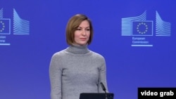 შივონ მაკგარი, ევროკომისიის პრესსპიკერი ბრიფინგზე 2026 წლის 16 მარტი. ბრიუსელი, ევროკომისია