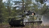 Finland hosts its first military exercise as a NATO member in the High North above the Arctic Circle