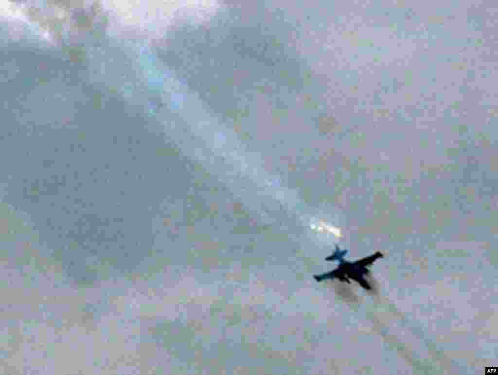 GEORGIA, TSKHINVALI : A Russian fighter jet fires on a Georgian position near Tskhinvali on August 8, 2008. Georgia has lost control of parts of the South Ossetia rebel capital of Tskhinvali amid Russian bombardment, a spokesman for Georgia's interior ministry said, after earlier claiming control of the city.