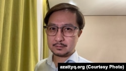 KazTAG editor in chief Amir Qasenov