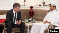 German Economy Minister Robert Habeck meets with Saad Sharida al-Kaabi, the energy minister of Qatar, in Doha on March 20.