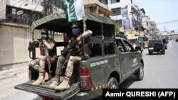 Army soldiers patrol in Rawalpindi.