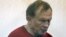 Russian historian and professor Oleg Sokolov is accused of murdering his girlfriend and former student. 