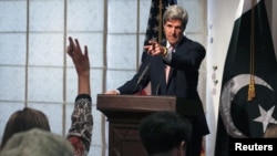 U.S. Senator John Kerry, seen here at a press conference in Pakistan in 2011, has called out Islamabad.