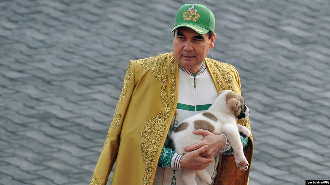 Turkmen President Gurbanguly Berdymukhammedov holds an alabai puppy as he takes part in celebrations for the Day of the Horse in Ashgabat in 2018.